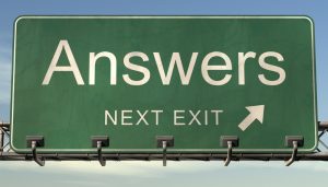 Road sign reading "Answers: Next Exit"
