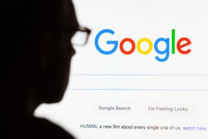Google screen with silhouette of a person