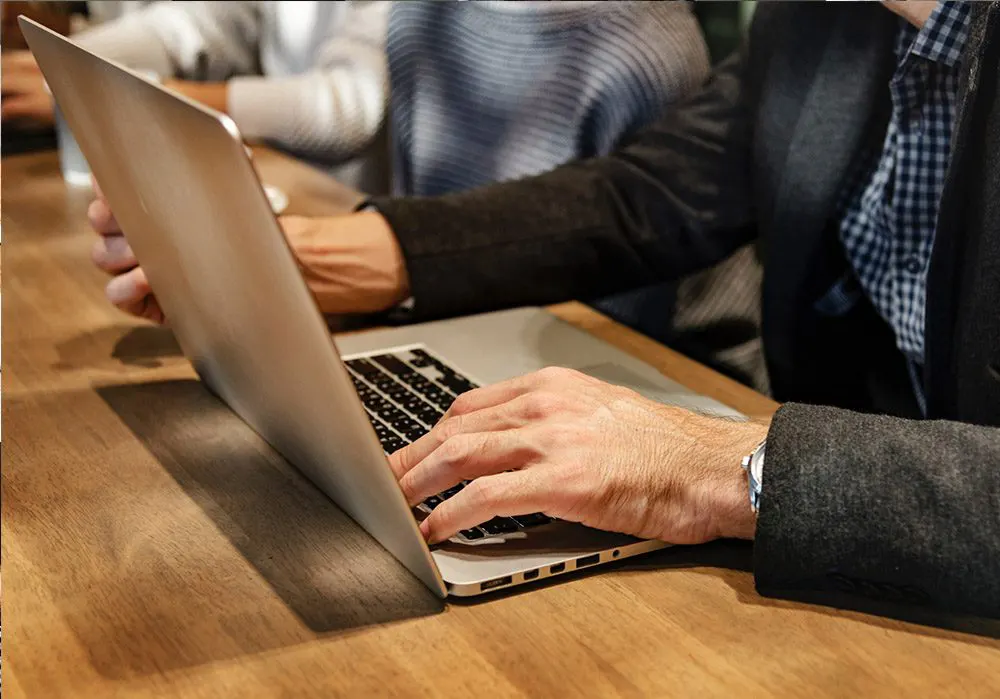 Person working on a laptop